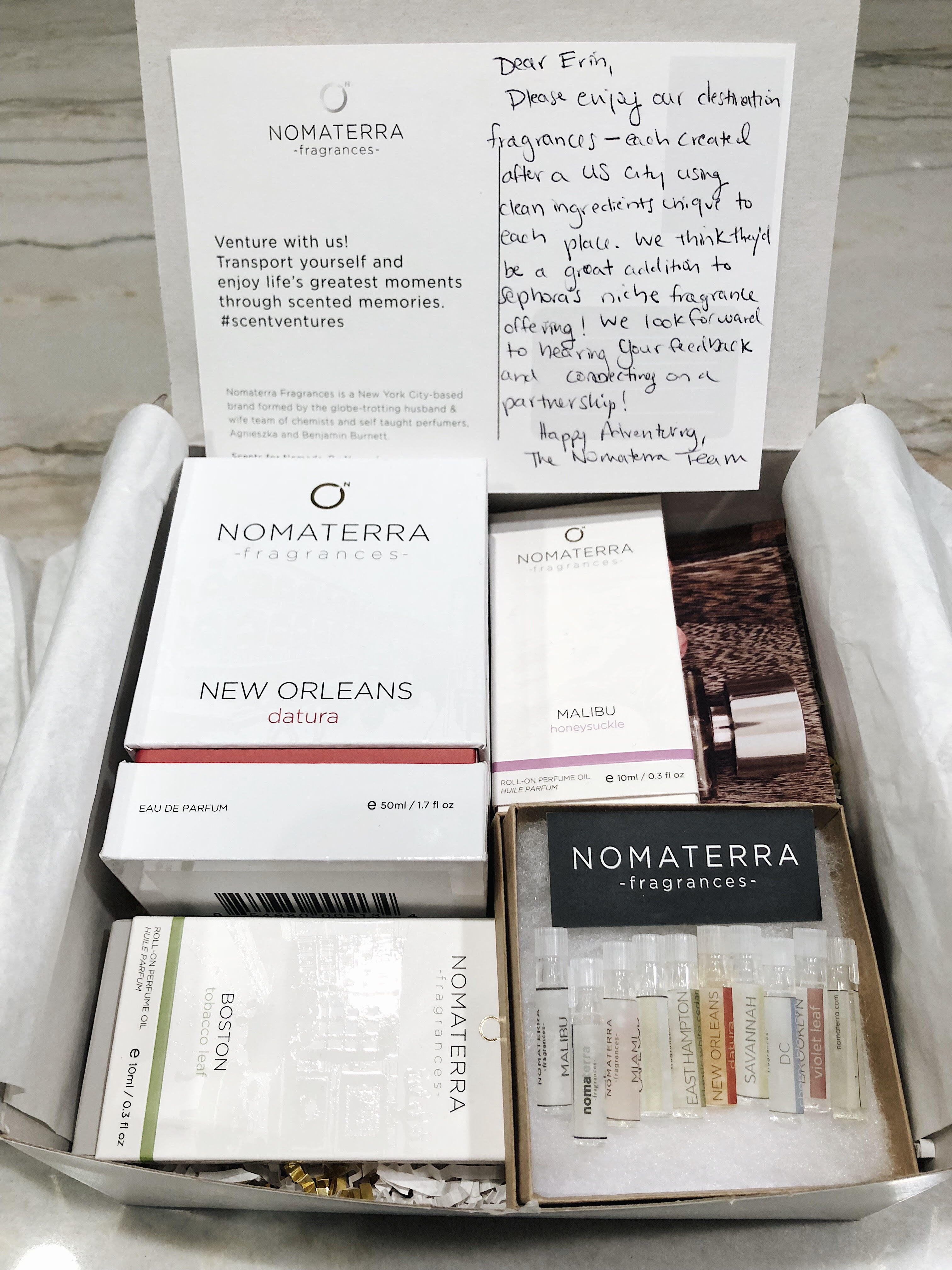 nomaterra products inside gift box, fragrances inside sample box